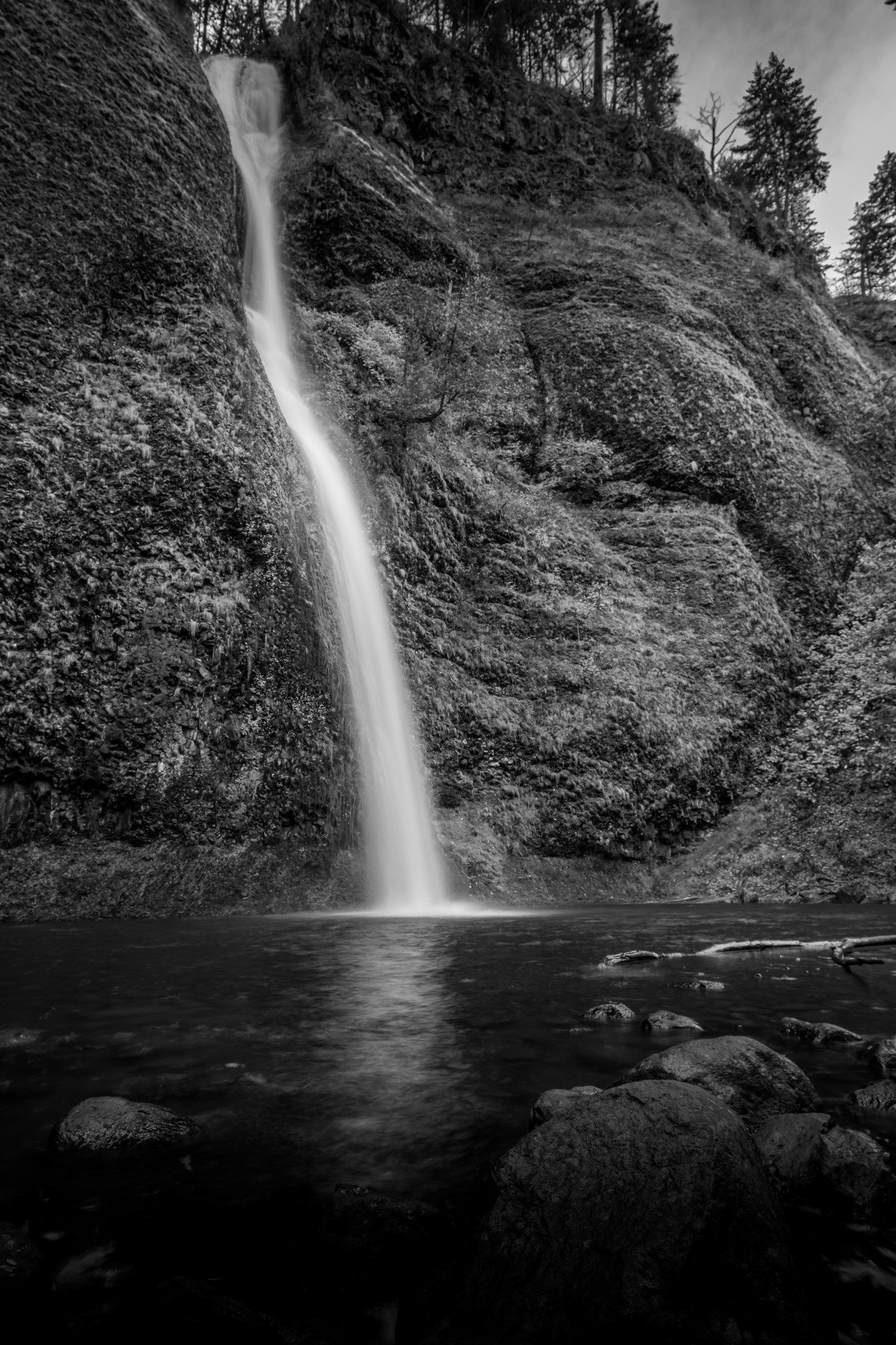 Waterfall streaming into the river